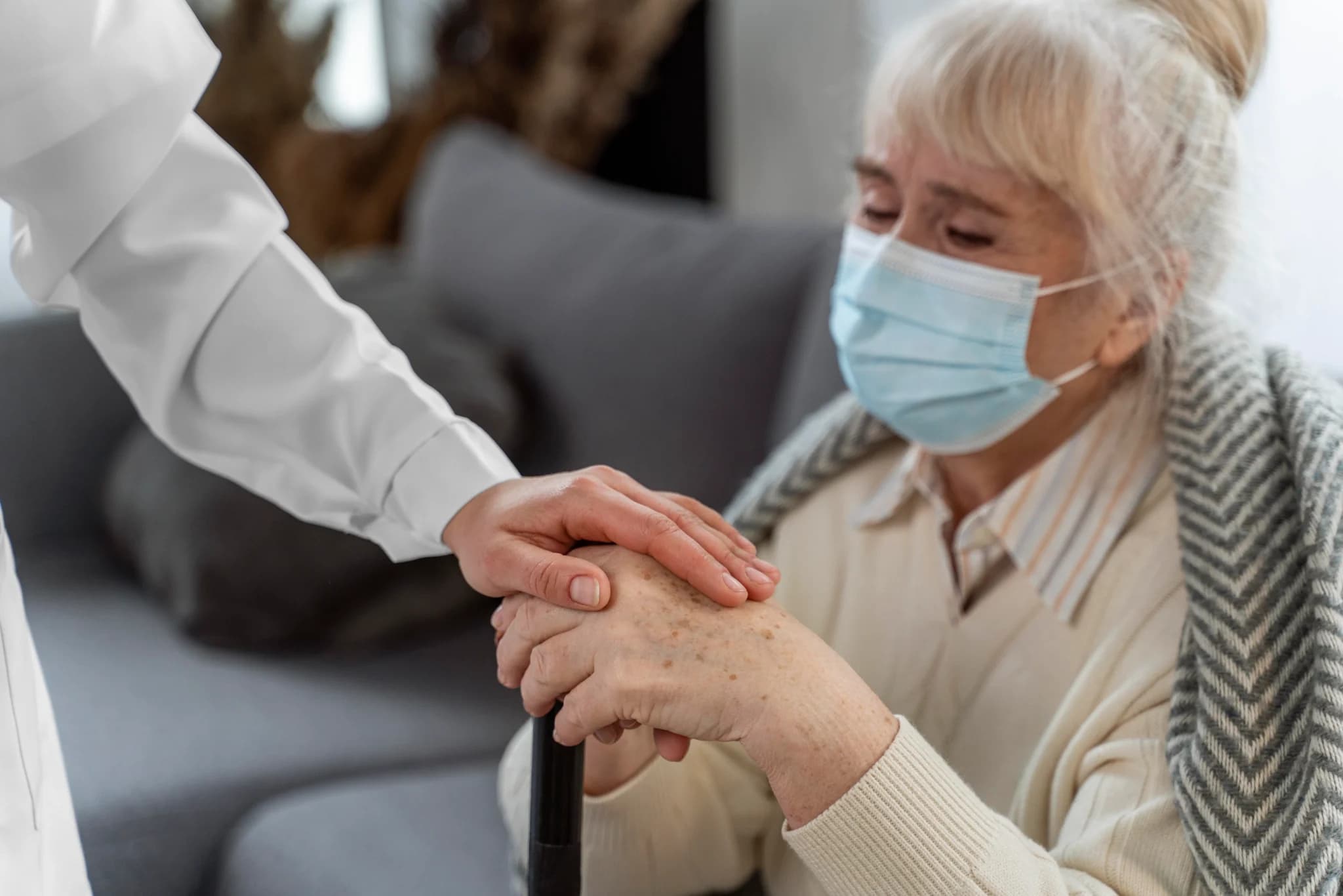 Overnight caregiver supporting an elderly client at home