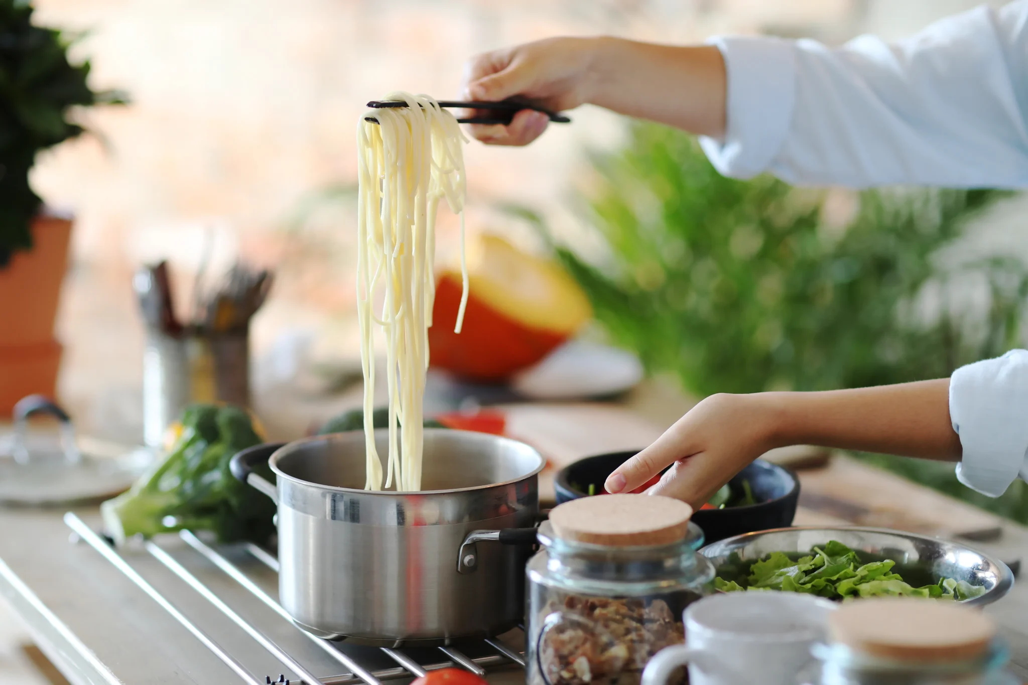 Caregiver preparing healthy meal for client